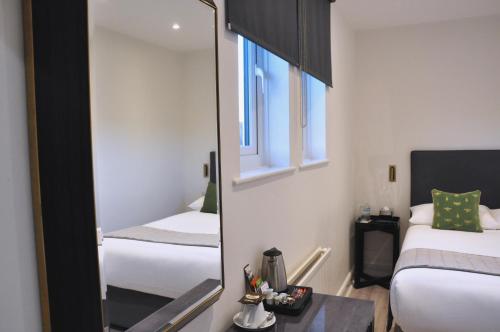 Habitación Doble con baño privado del hotel NAP INN. Foto 9
