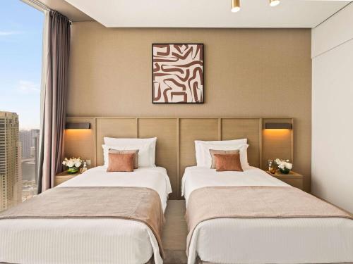 Suite Deluxe de 3 dormitorios del hotel Rixos Premium Dubai Jbr. Foto 1
