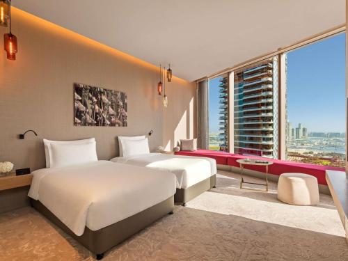 Habitación Doble Deluxe - 2 camas del hotel Rixos Premium Dubai Jbr