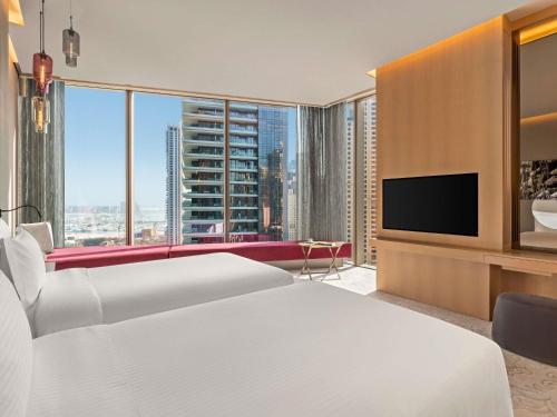 Habitación Doble Deluxe - 2 camas del hotel Rixos Premium Dubai Jbr. Foto 1
