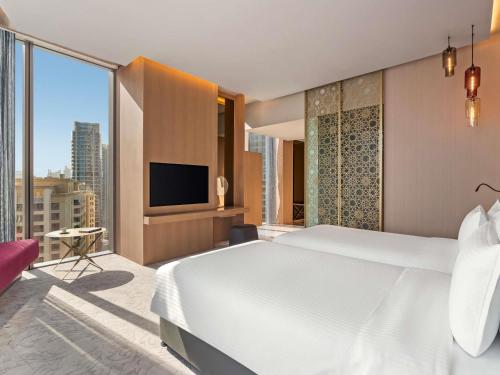 Habitación Doble Deluxe - 2 camas del hotel Rixos Premium Dubai Jbr. Foto 3