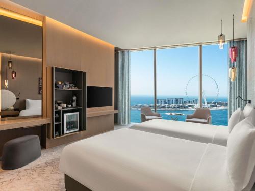 Habitación Premium - 2 camas individuales del hotel Rixos Premium Dubai Jbr. Foto 1