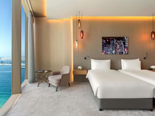 Habitación Premium - 2 camas individuales del hotel Rixos Premium Dubai Jbr. Foto 4