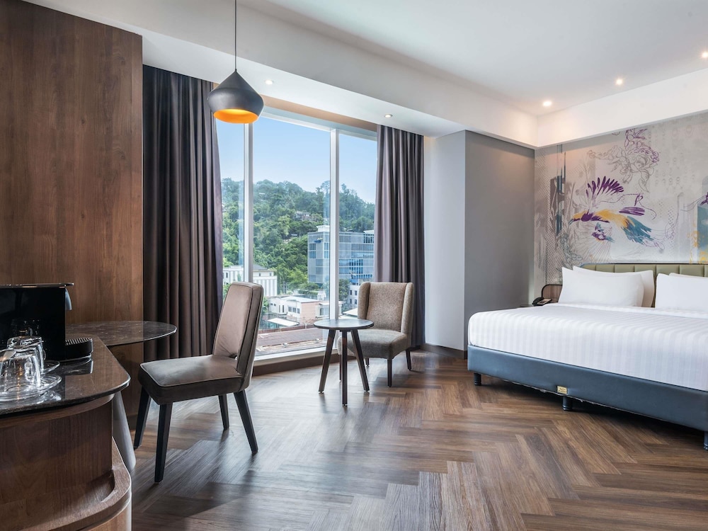 Premier con 1 cama doble del hotel Mercure Jayapura. Foto 2