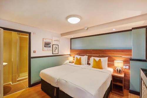 Habitación Doble - 2 camas del hotel Huttons. Foto 2