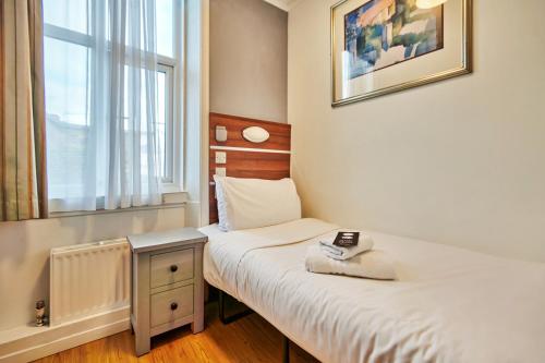 Habitación Individual del hotel Huttons. Foto 4