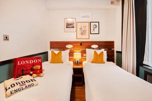 Habitación Doble - 2 camas del hotel Huttons. Foto 7