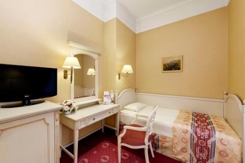 Habitación Individual Clásica del hotel Danubius Astoria City Center. Foto 3