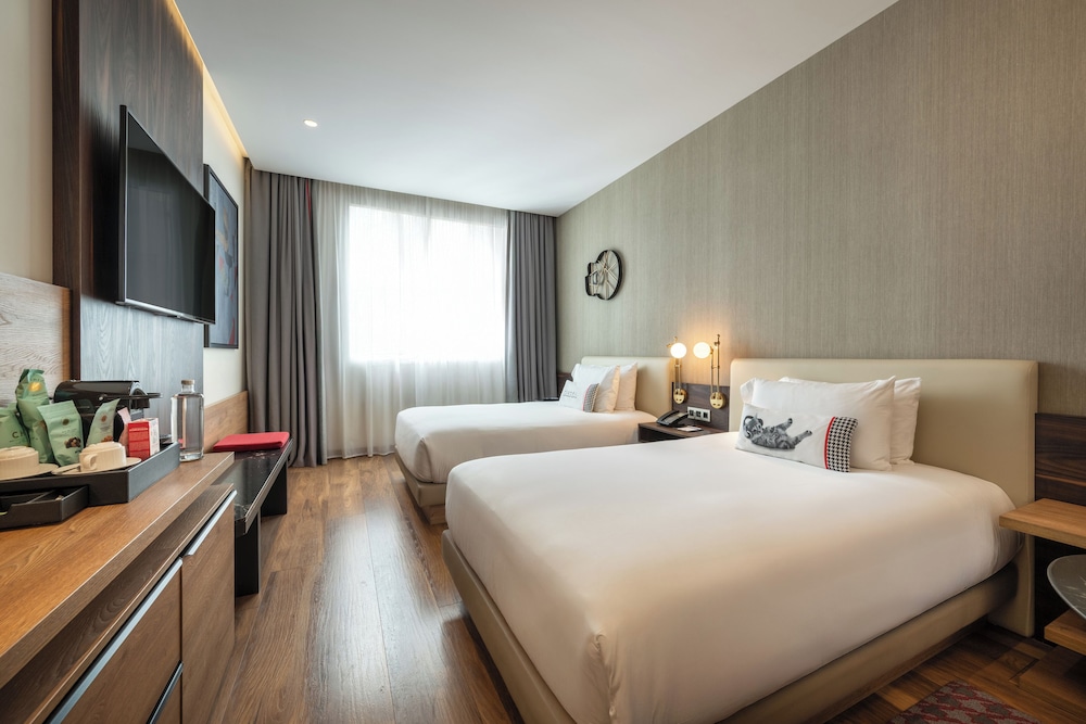 Suite familiar, varias camas, no fumadores del hotel Hyatt Centric Gran Via Madrid. Foto 7