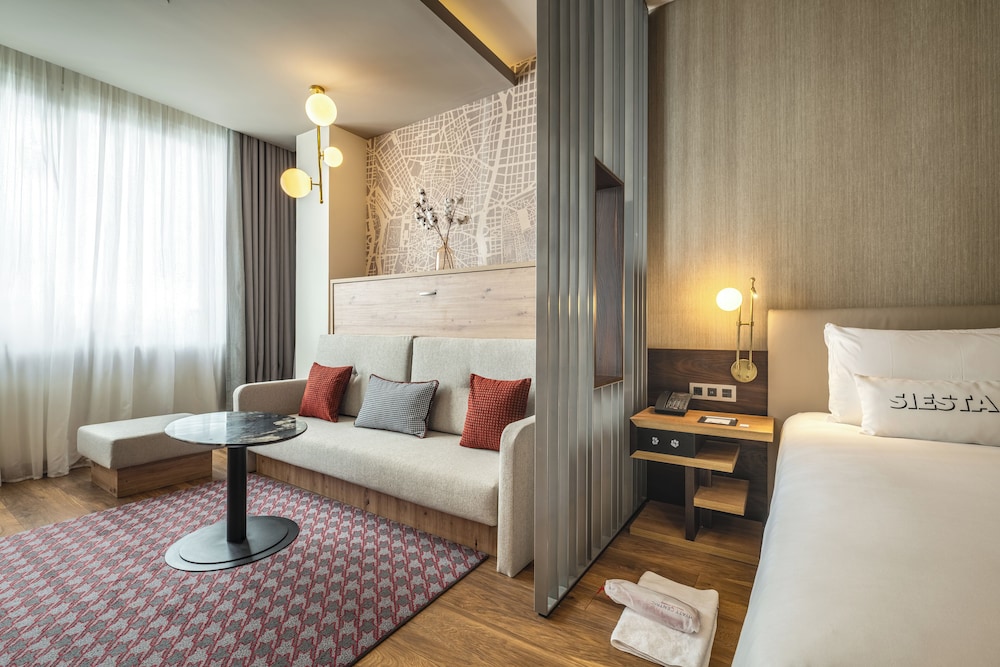 Suite junior, 1 cama de matrimonio grande, no fumadores del hotel Hyatt Centric Gran Via Madrid. Foto 6