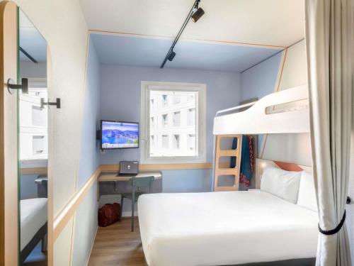 Habitación Doble con litera del hotel Ibis Budget Lugano Paradiso. Foto 1