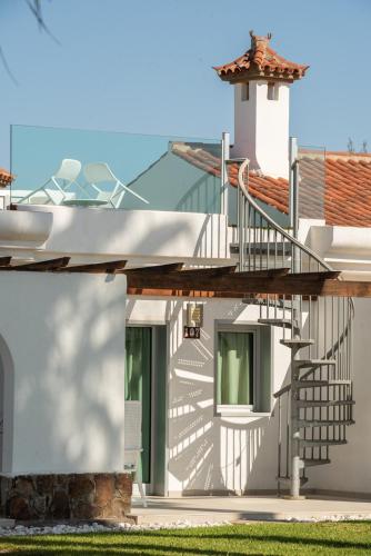 Suite con terraza y solárium del hotel LIVVO Dunagolf Suites. Foto 15