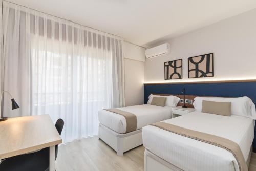 Habitación doble con balcón del hotel Boutique Roisa