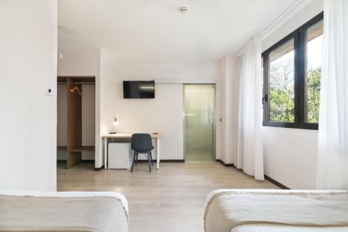 Habitación Doble del hotel Boutique Roisa. Foto 11