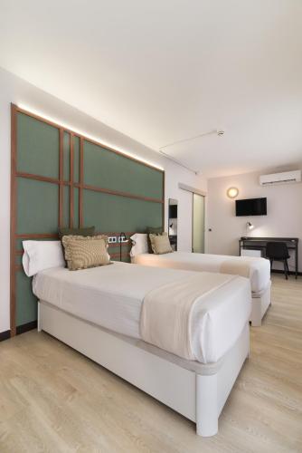 Suite Junior con balcón del hotel Boutique Roisa