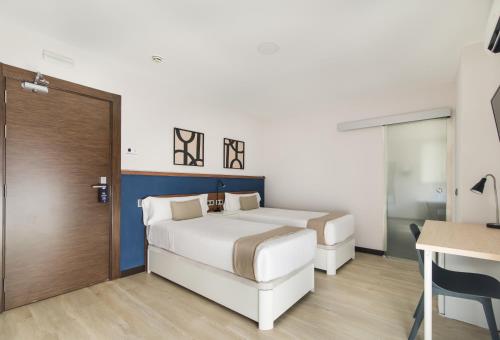 Habitación Doble Deluxe con balcón - 1 o 2 camas del hotel Boutique Roisa. Foto 4
