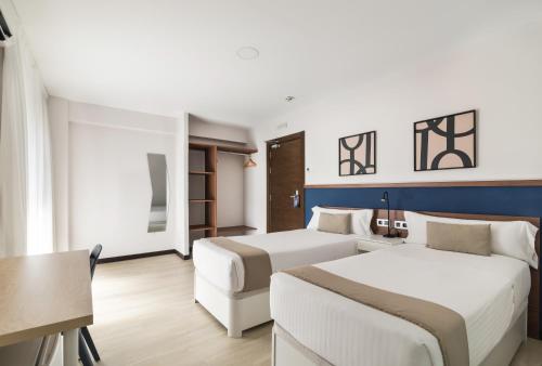 Habitación Doble Deluxe con balcón - 1 o 2 camas del hotel Boutique Roisa. Foto 12