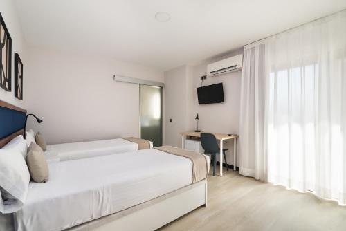 Habitación Doble Deluxe con balcón - 1 o 2 camas del hotel Boutique Roisa. Foto 15