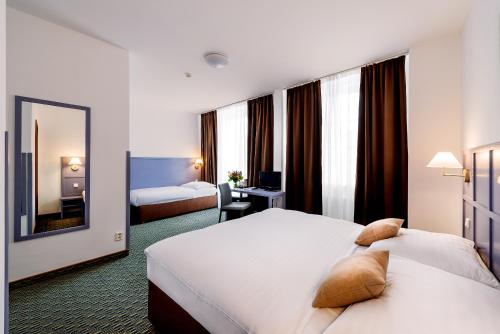 Habitación Triple Superior del hotel Central Prague. Foto 1