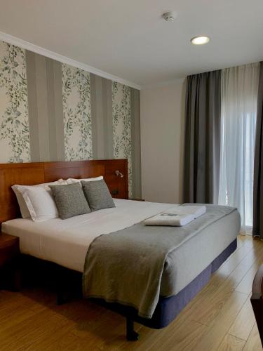 Habitación Superior con cama extragrande del hotel Vila Verde. Foto 1