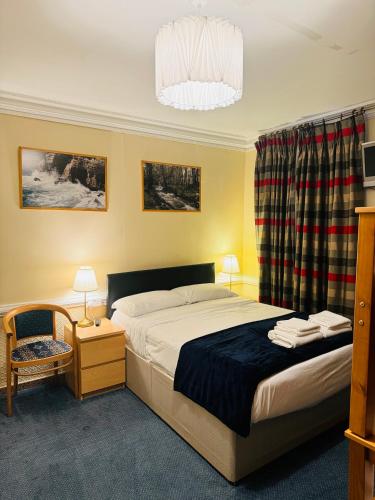 Habitación cuádruple del hotel Beverley House. Foto 4