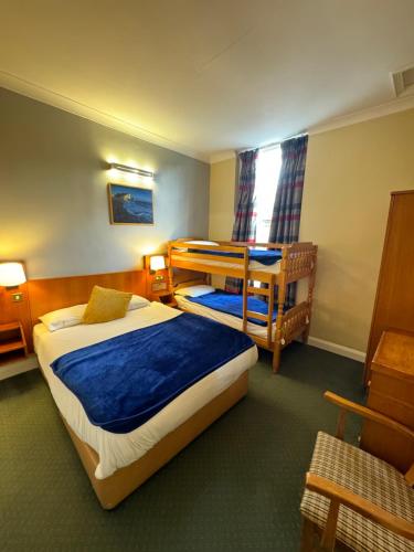 Habitación cuádruple del hotel Beverley House. Foto 14