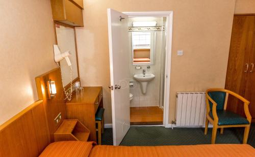 Habitación Individual Pequeña del hotel Beverley House. Foto 4