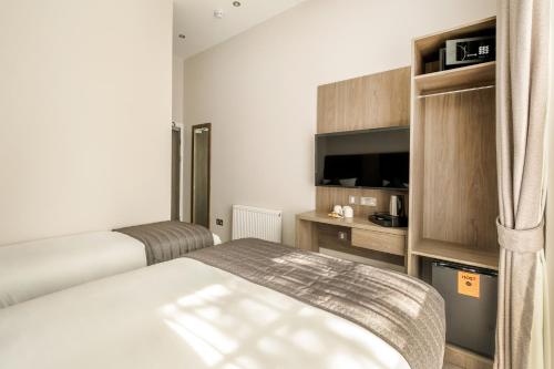 Habitación Triple del hotel Reem. Foto 2