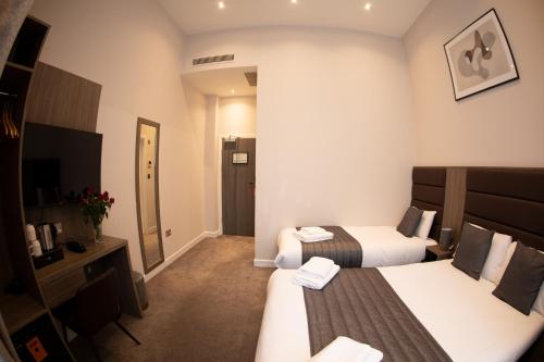 Habitación Triple del hotel Reem. Foto 5