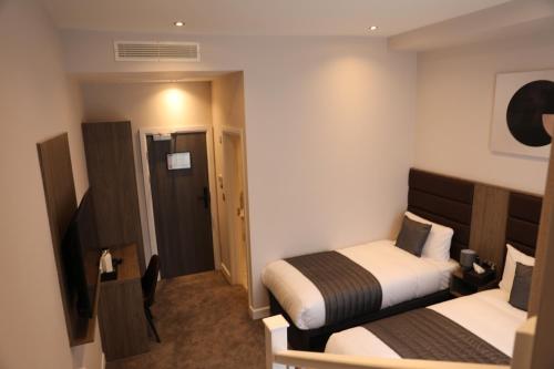 Habitación cuádruple del hotel Reem