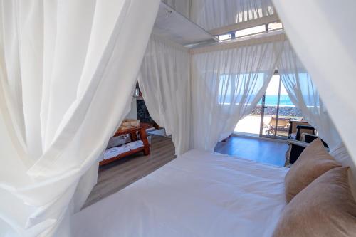 Suite Deluxe con vistas al mar del hotel Puntagrande. Foto 2