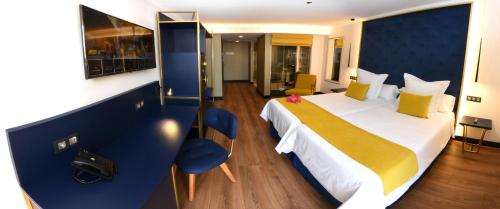 Habitación Doble Deluxe - 2 camas del hotel URBANSEA Bex. Foto 7