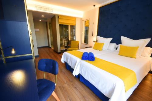 Habitación Doble Deluxe - 2 camas del hotel URBANSEA Bex. Foto 10