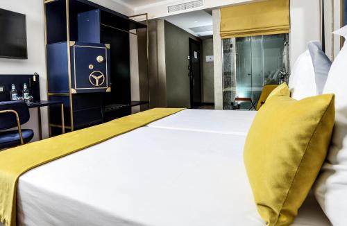 Habitación Doble Deluxe - 2 camas del hotel URBANSEA Bex. Foto 14