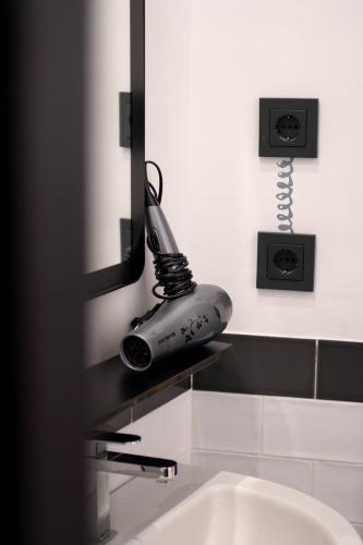 Cama en habitación compartida con 4 camas del hotel U-sense For You Sevilla. Foto 1