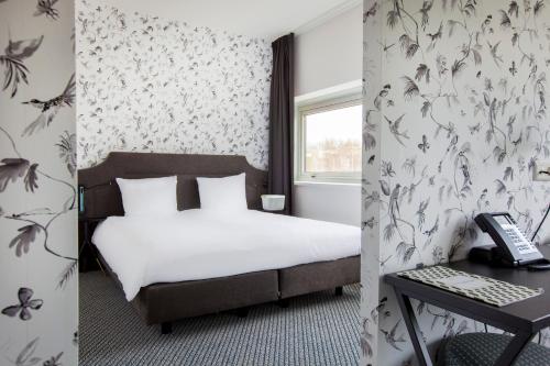 Habitación Familiar del hotel Ibis Styles Amsterdam Airport. Foto 4
