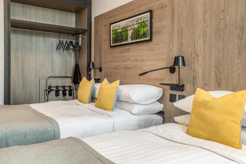 Habitación Triple Estándar del hotel The Princes Square. Foto 6