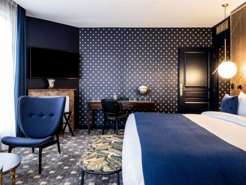 Suite Exécutive con 1 cama kingsize del hotel Aigle Noir Fontainebleau Mgallery. Foto 9