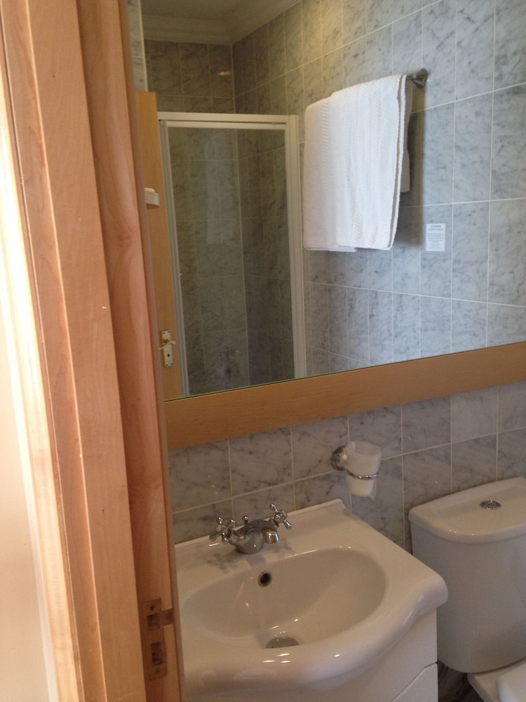 Habitación triple del hotel Troy. Foto 3