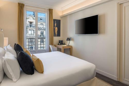 Habitación Doble Deluxe con cama extragrande y vistas a la ciudad del hotel Camille Paris Gare de Lyon, Tapestry Collection by Hilton. Foto 5