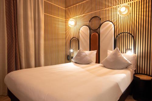 Habitación adaptada para personas con movilidad reducida - Cama grande del hotel De L'Espérance. Foto 3