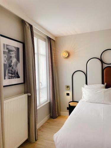 Habitación Triple del hotel De L'Espérance. Foto 5