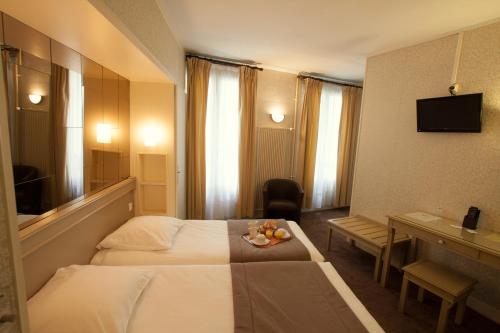 Habitación Doble Estándar - 1 o 2 camas del hotel Eiffel Kensington. Foto 3