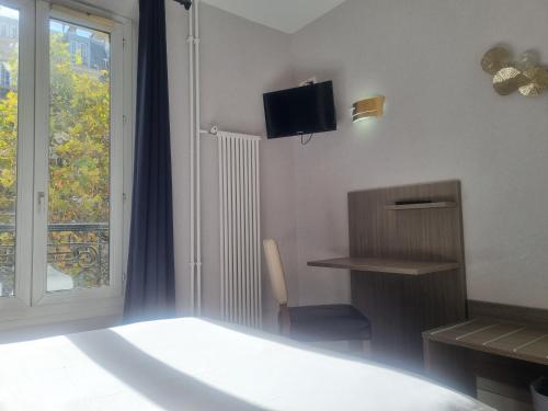 Habitación Doble con vistas a la torre Eiffel del hotel Eiffel Kensington. Foto 6