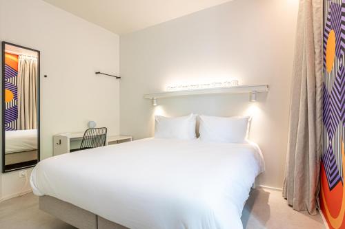 Habitación Doble con baño privado del hotel Graphik Montparnasse. Foto 1