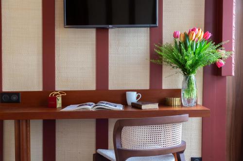 Chambre Grand Lit ou Lits Jumeaux Balcon del hotel Sacha. Foto 6