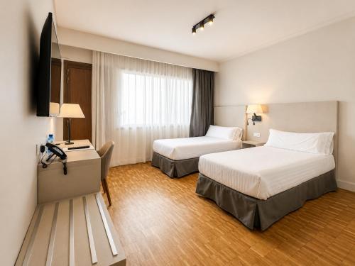 Habitación Doble con balcón - 1 o 2 camas del hotel Lauria. Foto 4