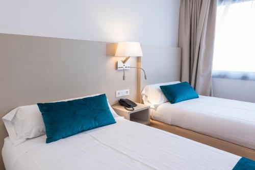 Habitación Doble Deluxe del hotel Lauria. Foto 4