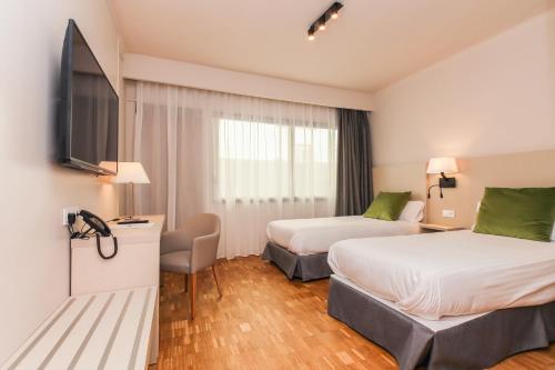 Habitación Doble Deluxe del hotel Lauria. Foto 5