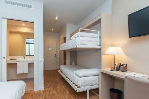 Habitación Cuádruple Deluxe del hotel Lauria. Foto 1